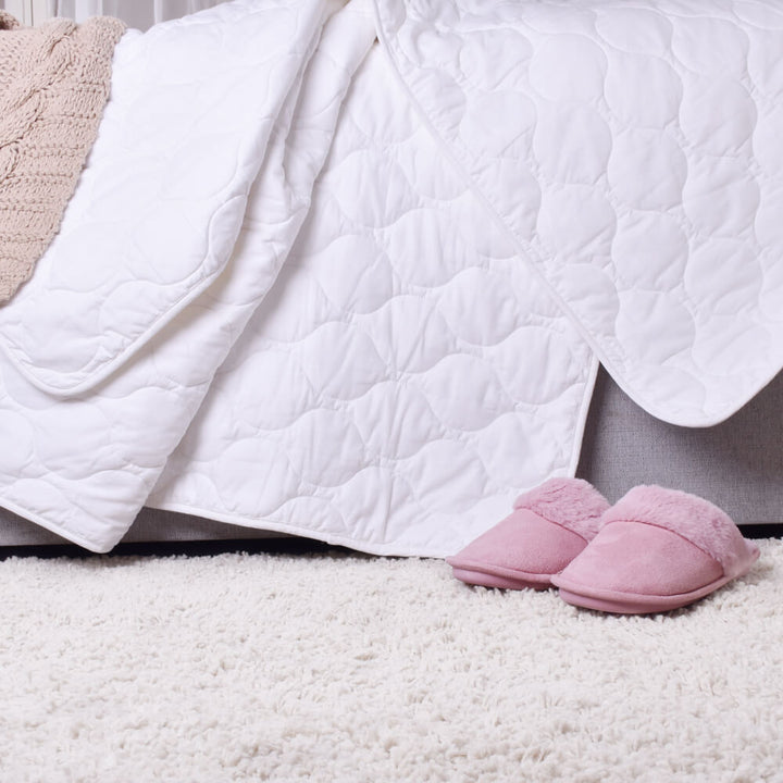 Pure cotton 6 tog autumn/winter duvet on the bed providing lightweight warmth and natural comfort