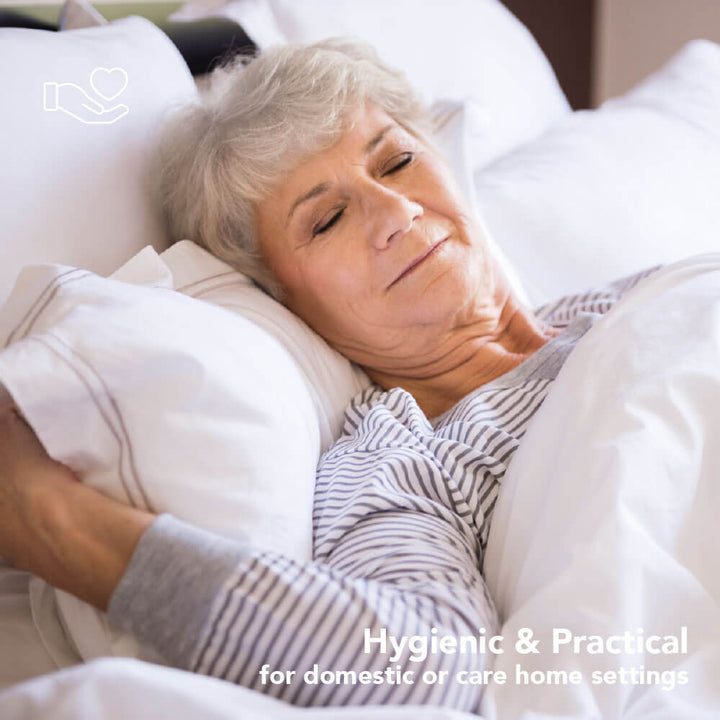 Elderly lady sleeping on the water resistant wipe clean pillows