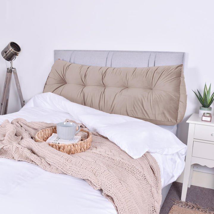 Beige Velvet Headboard Wedge used with a headboard on a bed