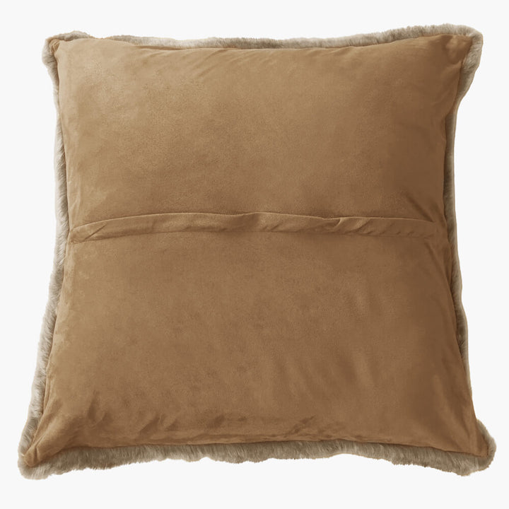 Back view of 60cm Alaskan fur cushion filled with a duck feather inner. The cushion shows the faux suede back and access zip isolated on a white background