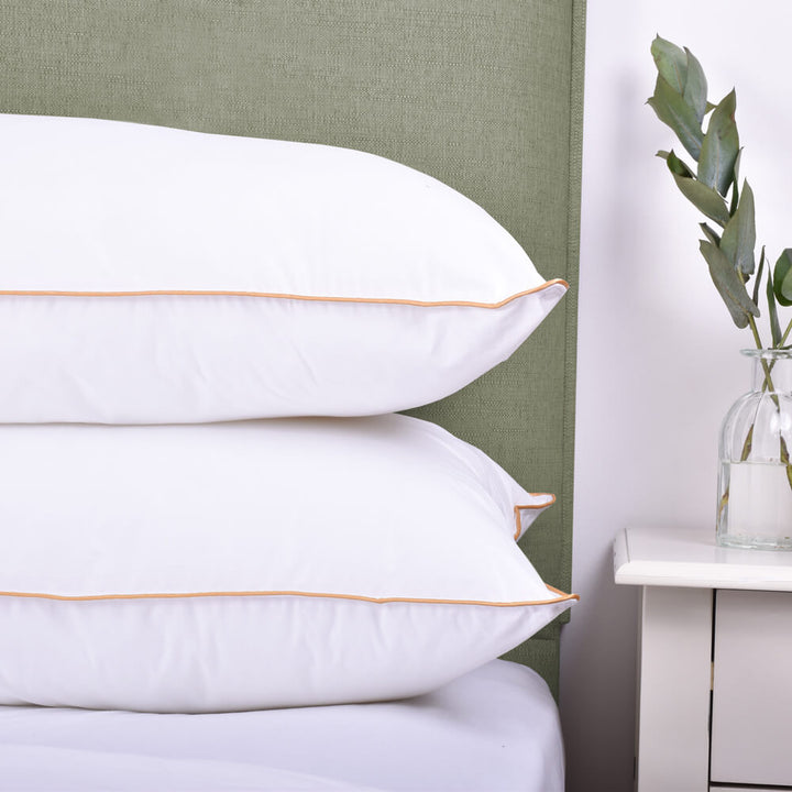 Pair of cotton Pillows with gold piped edge