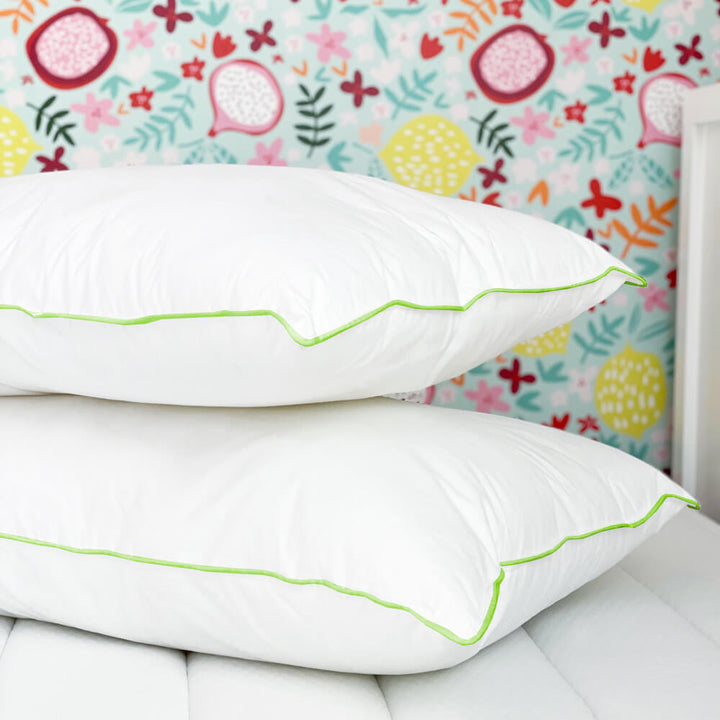 Pair of cotton Pillows with green piped edge