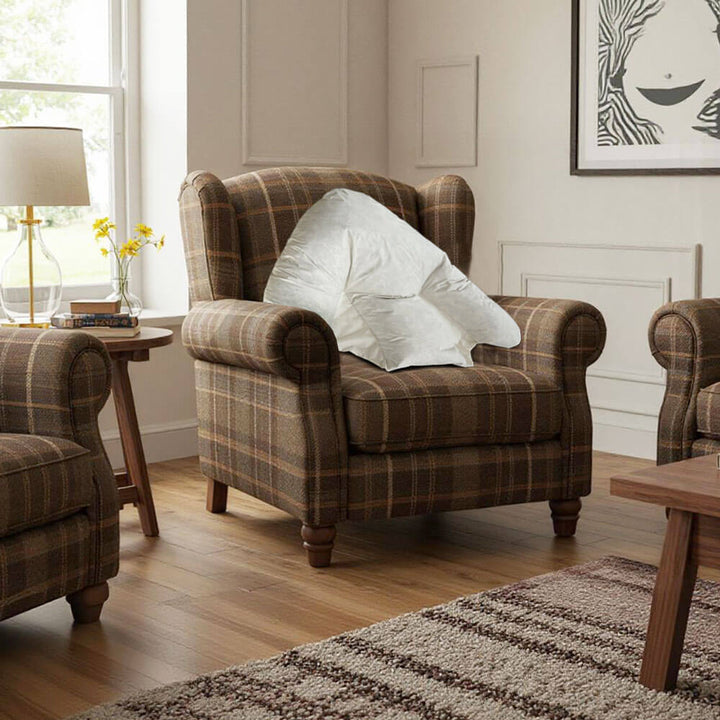 Duck Feather filled batwing support pillow in an armchair